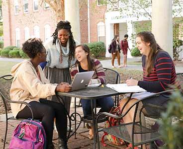 Students outside during a study session.